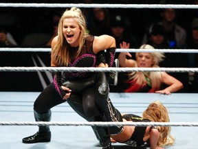 Natalya attempts to subdue opponent Carmella during the WWE Live Holiday Tour on in Peterborough, Ont., in 2016. (Clifford Skarstedt/Peterborough Examiner/Postmedia Network)