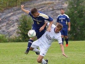 John Lappa/Sudbury Star
Ayden Meilleur, left, of Laurentian Vees, and a Bradford FC Porto Dragon Force U17 player battle for the ball during exhibition action at Laurentian University on Friday.