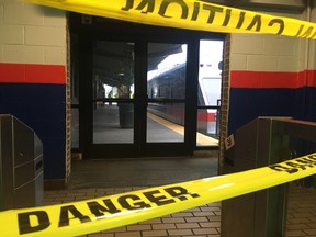 Police tape blocks off a train track at the 69th Street Terminal in Upper Darby, Pa., after a train collision early Tuesday, Aug. 22, 2017, injuring dozens of passengers. A regional rail train crashed into a parked train at the suburban Philadelphia terminal, a regional rail spokeswoman said. (AP Photo/Anthony Izaguirre)