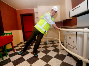 Members of the media and Ottawa Mayor Jim Watson received a tour of the crazy kitchen exhibit Tuesday at the Science and Technology Museum in Ottawa Tuesday Aug 22, 2017. TONY CALDWELL