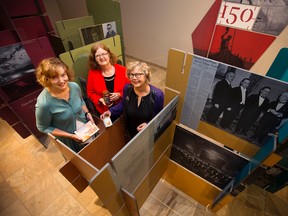 (left to right) Provincial Archives of Alberta Executive Director Leslie Latta, Edmonton-Mill Creek MLA Denise Woollard and Edmonton Food Bank Executive Director Marjorie Bencz, pose for a photo as they visit the 150 Firsts: How Alberta Changed Canada ... Forever exhibit, at the Provincial Archives of Alberta, 8555 Roper Road, Tuesday Aug. 22, 2017. Provincial Archives of Alberta is hoping visitors to the free exhibit will help collect 150 pounds of food for the Edmonton Food Bank. Photo by David Bloom