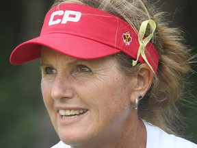 Lorie Kane wearing a Dawn Coe-Jones ribbon on her visor at the Canadian Pacific Women's Open practice round at the Ottawa Hunt and Golf Club in Ottawa on Aug. 22, 2017. (Tony Caldwell/Postmedia)