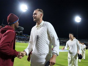 England bowler Stuart Broad leaves the pitch with teammates after their win on day 3 of the first Test cricket match between England and the West Indies at Edgbaston. (GETTY IMAGES)