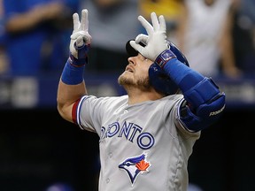 Jays slugger Josh Donaldson celebrates after hitting a home run against Tampa Bay on Tuesday night. (AP)