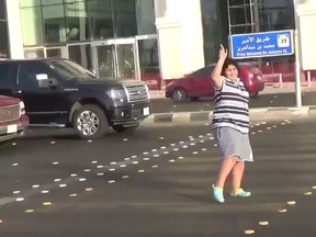 In this screenshot, a Saudi boy, 14, dances in the streets to 'Macarena' in the city of Jiddah, Saudi Arabia. (Twitter/@xmyd3)