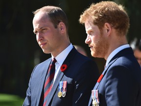 This is a Sunday, April 9, 2017, file photo of Britain's Prince William, left, and Britain's Prince Harry as they arrive at the Canadian National Vimy Memorial in Vimy, near Arras, northern France, to attend the commemorations of the 100th anniversary of the Battle of Vimy Ridge. Princes William and Harry have spoken candidly about the death of their mother, Princess Diana, in an interview marking 20 years since she was killed in a car crash. (Philippe Huguen/Pool Photo, File via AP)