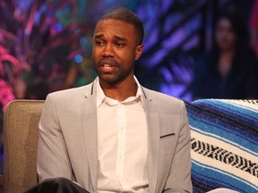 Former Bachelor in Paradise contestant DeMario Jackson gets emotional during an interview with host Chris Harrison. (ABC)