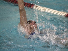 The Blue Dolphins’ Samia Davidson (pictured) practices her backstroke in anticipation of the provincial finals in Edmonton Aug. 18 to 19 (Jeremy Appel | Whitecourt Star).