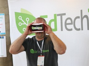 BRUCE BELL/THE INTELLIGENCER
Jeffrey Humphries of EdTech Team Canada looks through some virtual reality goggles at the Eastern Ontario Summit featuring Google for Education at Bayside Secondary School on Wednesday afternoon.