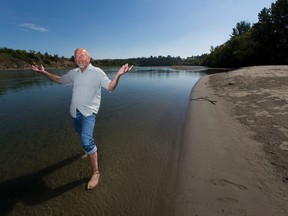 For the last two months, due to conditions created by the new LRT bridge, a massive and lovely beach has popped up on the banks of the North Saskatchewan river. Cloverdale resident Paul Bunner and others have been enjoying it for weeks now. Taken on Thursday August 17, 2017, in Edmonton.  Greg  Southam / Postmedia