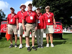 Smiths Falls volunteer marshals Clare Sanderson, Brian Doherty, Larry Macintosh, Theresa Macintosh and Diane Thomas stand on the first tee  during the 2017 Canadian Pacific Women's Open Championship Pro Am at the Ottawa Hunt and Golf Club on Aug. 23, 2017. (Tony Caldwell/Postmedia)