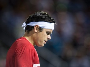Milos Raonic of Canada reacts during his match against Adrian Mannarino of France during second round of play at the Rogers Cup tennis tournament on Aug. 9, 2017. (THE CANADIAN PRESS/Paul Chiasson)
