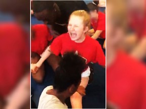 High school cheerleaders repeatedly pushed into painful splits.
