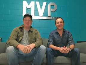 Mitch Bennet, 21, left, and Derek Lamoureux, 22, from Strathroy-Caradoc sit in Western University’s MVP lab. They are the co-founders of We’re Weddings, a tech company that connects brides to wedding vendors. JONATHAN JUHA/STRATHROY AGE DISPATCH/POSTMEDIA NETWORK