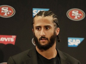This Jan. 1, 2017, file photo shows then San Francisco 49ers quarterback Colin Kaepernick speaking at a news conference after the team's NFL football game against the Seattle Seahawks in Santa Clara, Calif. (AP Photo/Marcio Jose Sanchez, File)