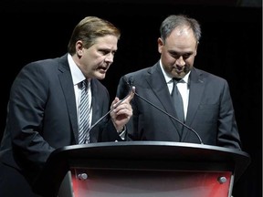 Ottawa Senators assistant general manager Randy Lee tells a story about Bryan Murray as general manager Pierre Dorion, right, looks on, during a celebration of Murray's life at the Canadian Tire Centre.JUSTIN TANG / THE CANADIAN PRESS