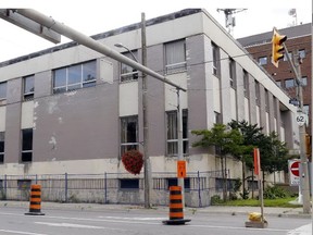 Luke Hendry/The Intelligencer
The building at 45 Bridge St. E. in Belleville remains empty Thursday. The property's manager and the city's chief building official remain at odds over its condition. A fence ordered erected in 2014 remains in place amid municipal concern about the safety of the building's eastern wall.