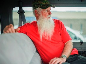 In this undated photo, James Green, co-leader of the Aggressive Christianity Missions Training Corps, waits in the parking lot of the Cibola County Magistrate Court in Grants, N.M. Four members of the New Mexico paramilitary religious sect rocked by child sexual abuse allegations were arrested while trying to flee the state in two vans full of children, authorities said Thursday, Aug. 24, 2017. (Adron Gardner/Gallup Independent via AP)