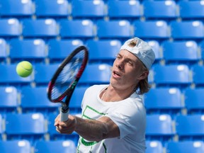 Denis Shapovalov returns the ball during a training session as he prepares for the upcoming U.S. Open, Thursday, August 17, 2017 in Montreal. (THE CANADIAN PRESS/Paul Chiasson)