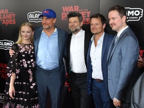 This file photo taken on July 10, 2017, shows Matt Reeves (far right) and ‘War for the Planet of the Apes stars (from left) Amiah Miller, Woody Harrelson, Andy Serkis and Steve Zahn. (Getty Images)