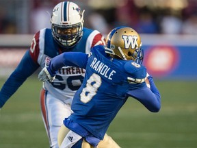 Bombers defensive back Chris Randle had an interception in the first quarter that led to a touchdown. He also picked Montreal QB Darian Durant in OT to set up the winning field goal. (THE CANADIAN PRESS)