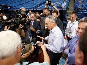 Major League Baseball Commissioner Rob Manfred speaks with reporters before the start of a game between the Tampa Bay Rays and the Toronto Blue Jays on August 23, 2017 at Tropicana Field in St. Petersburg, Fla. (BRIAN BLANCO/Getty Images)