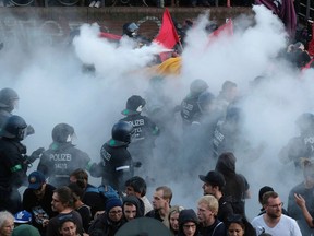 Police officers in operation during a protest against the G20 summit in Hamburg, Germany, on July 6, 2017. (Sebastian Willnow/dpa via AP)