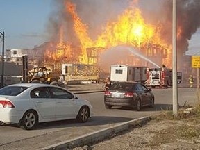 A massive fire broke out in Whitby Thursday night that caused nearby residents to evacuate. (Spencer Guerreiro/SUPPLIED)