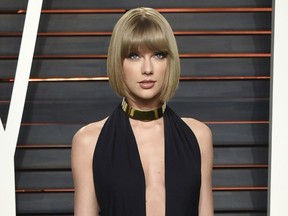 In this Feb. 28, 2016 file photo, singer Taylor Swift attends the Vanity Fair Fair Oscar Party in Beverly Hills, Calif. Swift posted the title of her new album, "reputation," and announced on Instagram it will be out Nov. 10. (Photo by Evan Agostini/Invision/AP, File)