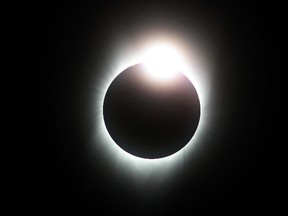 A total eclipse with the 'diamond ring' effect is seen from South Mike Sedar Park on August 21, 2017 in Casper, Wyoming. (Photo by Justin Sullivan/Getty Images)