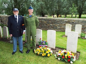 Courtesy Tom MacHardy
Belgian historian Jacques De Ceuninck, left, and Trenton's Tom MacHardy stand next to the graves of MacHardy's great-uncle, Alexander William MacHardy, and the latter's gunner, William Alexander Rodger, in Tournai, Belgium in July 2014. Pilot Billy MacHardy and Rodger, his gunner, died one day before the end of the First World War.