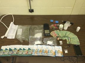Drugs and cash that was seized by during a traffic stop in Virden, Man., in the early afternoon of Aug. 23, 2017, when Westman RCMP witnessed a 31-year-old man driving a pickup truck and arrested him for breaching conditions of his undertaking. Various drug paraphernalia were seized along with more than 75 grams of methamphetaine, 77 grams of cocaine, 27 grams of marijuana, 12 grams of 'shatter' and a small quantity of Canadian cash. Virden is located 274 kms west of Winnipeg, near the Saskatchewan border. HANDOUT/Westman RCMP