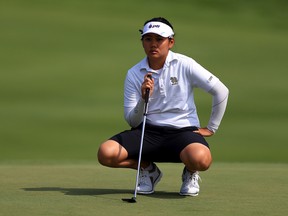 Sherman Santiwiwatthanaphong of Thailand eyes up a putt on the 18th green during round two of the Canadian Pacific Women's Open at the Ottawa Hunt & Golf Club on Aug. 25, 2017. (Vaughn Ridley/Getty Images)