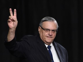 This file photo taken on October 4, 2016' shows Sheriff Joe Arpaio attending a rally by Republican presidential candidate Donald Trump in Prescott Valley, Arizona. In a statement released by the White House on August 25, 2017, US President Donald Trump granted a Presidential pardon to Arpaio, former Sheriff of Maricopa County, Arizona. Arpaio, 85, was convicted of criminal contempt of court charges for violating an order that he refrain from detaining illegal immigrants, which the courts said was the job of federal authorities. (ROBYN BECK/AFP/Getty Images)