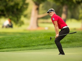 Brooke Henderson reacts after narrowly missing a putt during the second round of the CP Women's Open at the Ottawa Hunt and Golf Club on Aug. 25, 2017. (Darren Brown/Postmedia)