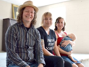 Local artists are teaming up to bring something new and fresh to the small community, working from a newly-renovated space on River Street in Alvinston. From left are Jason Benoit, Liana Russwurm, Vanessa Benoit and her young son Bruce. Melissa Schilz/Postmedia Network