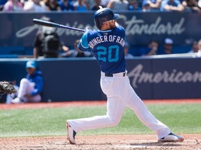 Toronto Blue Jays' Josh Donaldson hits a two-run home run against the Minnesota Twins during fifth inning American League MLB baseball action in Toronto on Saturday, August 26, 2017. (THE CANADIAN PRESS/Chris Young)