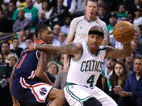 This May 10, 2017, photo shows Boston Celtics guard Isaiah Thomas (4) driving to the basket during the first quarter of a second-round NBA playoff series basketball game in Boston. (AP Photo/Charles Krupa, File)