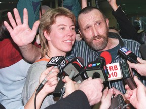 Norbert Reinhart, with wife Casey at his side, speaks to media at Toronto's Pearson Airport after he was released from FARC captivity in early 1999. Postmedia, file