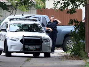 Police surrounded a residence on Magnus Avenue, in Winnipeg, where they believed the occupants of a truck they had been chasing were located. Saturday, August 26, 2017. Chris Procaylo/Winnipeg Sun/Postmedia Network