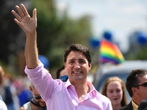 Prime Minister Justin Trudeau marches in the Ottawa Capital Pride parade, Sunday, August 27, 2017. THE CANADIAN PRESS/Justin Tang