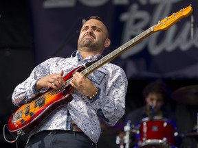 Vocalist and bassist Mick Maratta performs with his band Sons Of Rhythm during London Bluesfest at Harris Park in London, Ont. on Sunday August 27, 2017. (DEREK RUTTAN, The London Free Press)