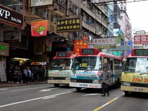 Buses fill the streets of Hong Kong, a bustling city of 7.3 million. PAT LEE PHOTO