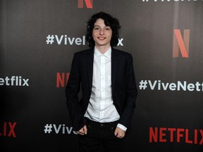 Finn Wolfhard from the cast of 'Stranger Thing' poses for photographs during a Netflix Red Carpet #ViveNetflix in Mexico City, on August 02, 2017. / AFP PHOTO / Bernardo Montoya