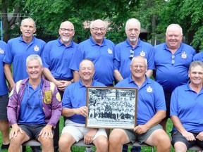 Members of the 1967 Mitchell Pee Wee baseball team, which was the first team from Mitchell to win the Ontario Baseball Association (OBA) ‘C’ championship, gathered Aug. 19 for a 50-year reunion at the Mitchell Legion, br. 128. Those that were in attendance sat in the same position this time as they did in the 1967 team photo, an enlarged version of which is being held in the front row. Back row (left): Warren Parrott (who was absent for the ’67 photo), Paul Shean, Jamie Cardwell, Rick O’Donnell, Bill Bradshaw, Steve Chessell and Dean Machan. Front row (left): Bob Binning, Bill Walt, Paul Clarke and Jack McNaughton. ANDY BADER/MITCHELL ADVOCATE