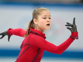In this Feb. 20, 2014 file photo, Julia Lipnitskaya of Russia competes in the women's free skate figure skating finals at the Iceberg Skating Palace during the 2014 Winter Olympics, in Sochi, Russia. (AP Photo/Ivan Sekretarev, file)