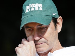 In this Dec. 5, 2015, file photo, Baylor head coach Art Briles gets emotional in the tunnel after his senior players were introduced before an NCAA college football game against Texas, in Waco, Texas. (AP Photo/LM Otero, File)