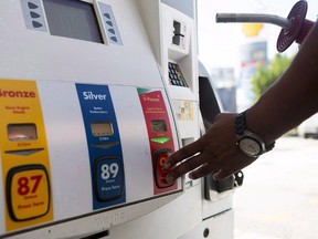 Filling up at the gas pumps. (Veronica Henri/Postmedia Network/file photo)