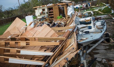 Debris is scattered around a trailer home in the wake of Hurricane Harvey in Refugio, Texas, Monday, Aug. 28, 2017. (Nick Wagner/Austin American-Statesman via AP) ORG XMIT: TXAUS502