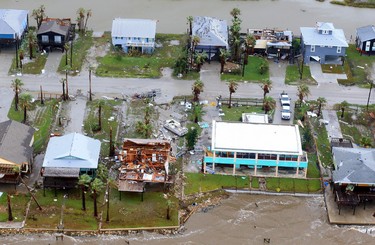 This aerial photo shows a view of damage in the wake of Hurricane Harvey, Monday, Aug. 28, 2017, in Corpus Christi, Texas. Harvey hit the coast as a Category 4 hurricane. (Gabe Hernandez/Corpus Christi Caller-Times via AP) ORG XMIT: TXCOR213